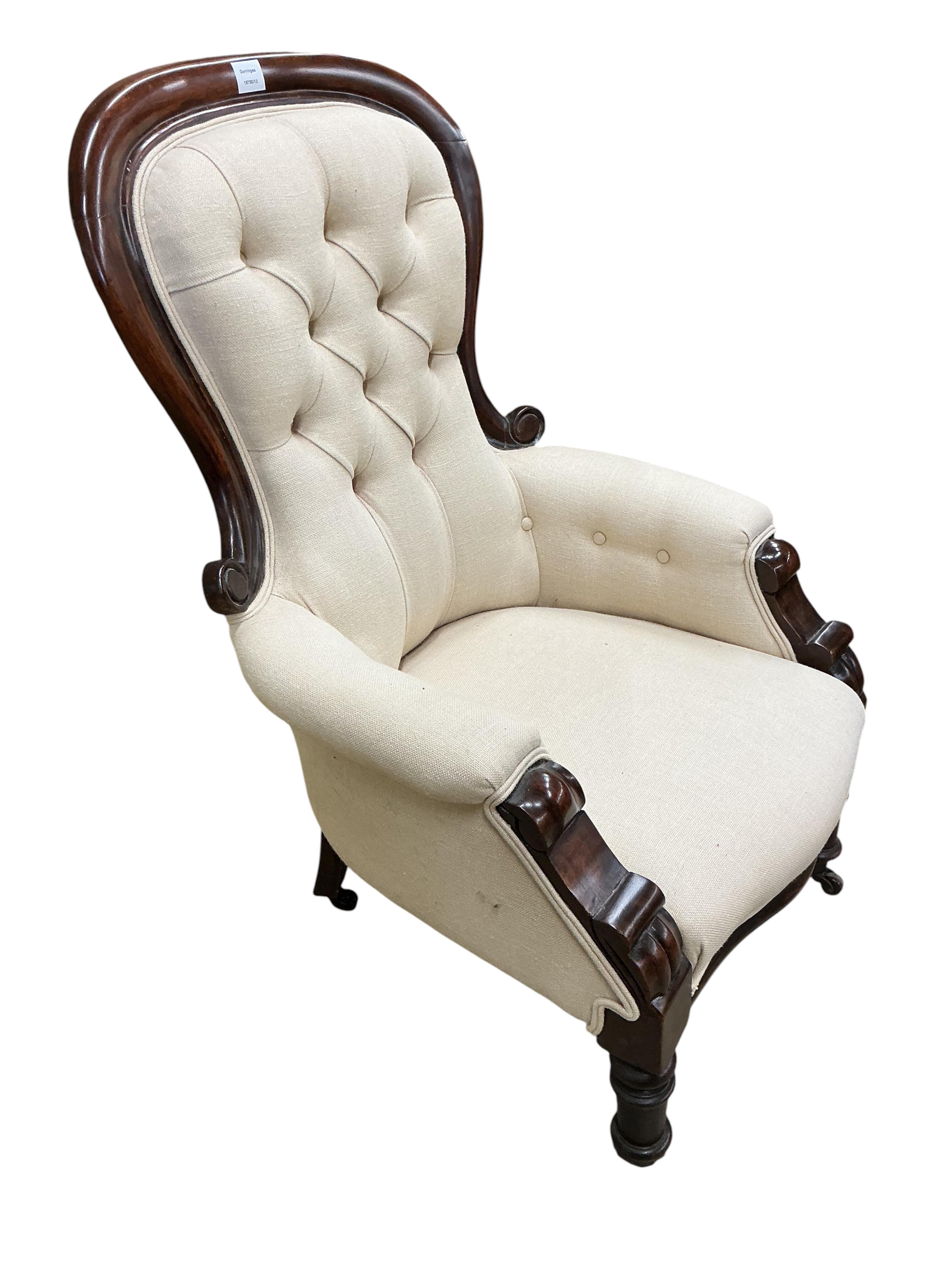 A Victorian mahogany upholstered spoonback armchair, width 70cm, depth 66cm, height 104cm